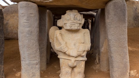 San Agustin (San Agustín), Huila, Colombia : pre-columbian megalithic sculptures in the archaeological park. Impressive megaliths carved with volcanic stone. Gardians of the dead resting in the tomb.